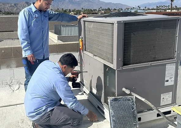 All Valley Air HVAC technicians in navy uniforms