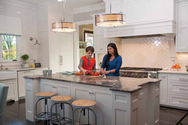 Family preparing a meal in a comfortable, air-conditioned home